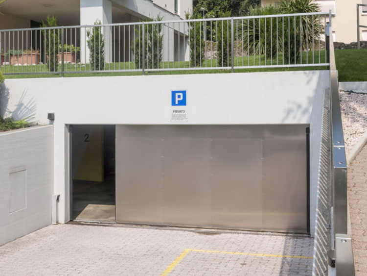 Porta garage acciaio inox scorrevole